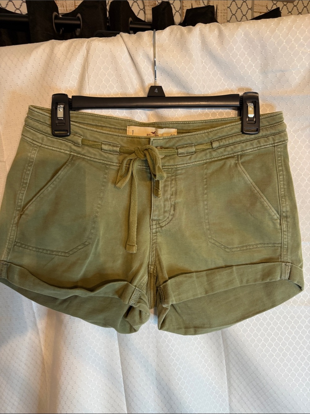 Hollister cuffed shorts with four pockets and olive green color size one